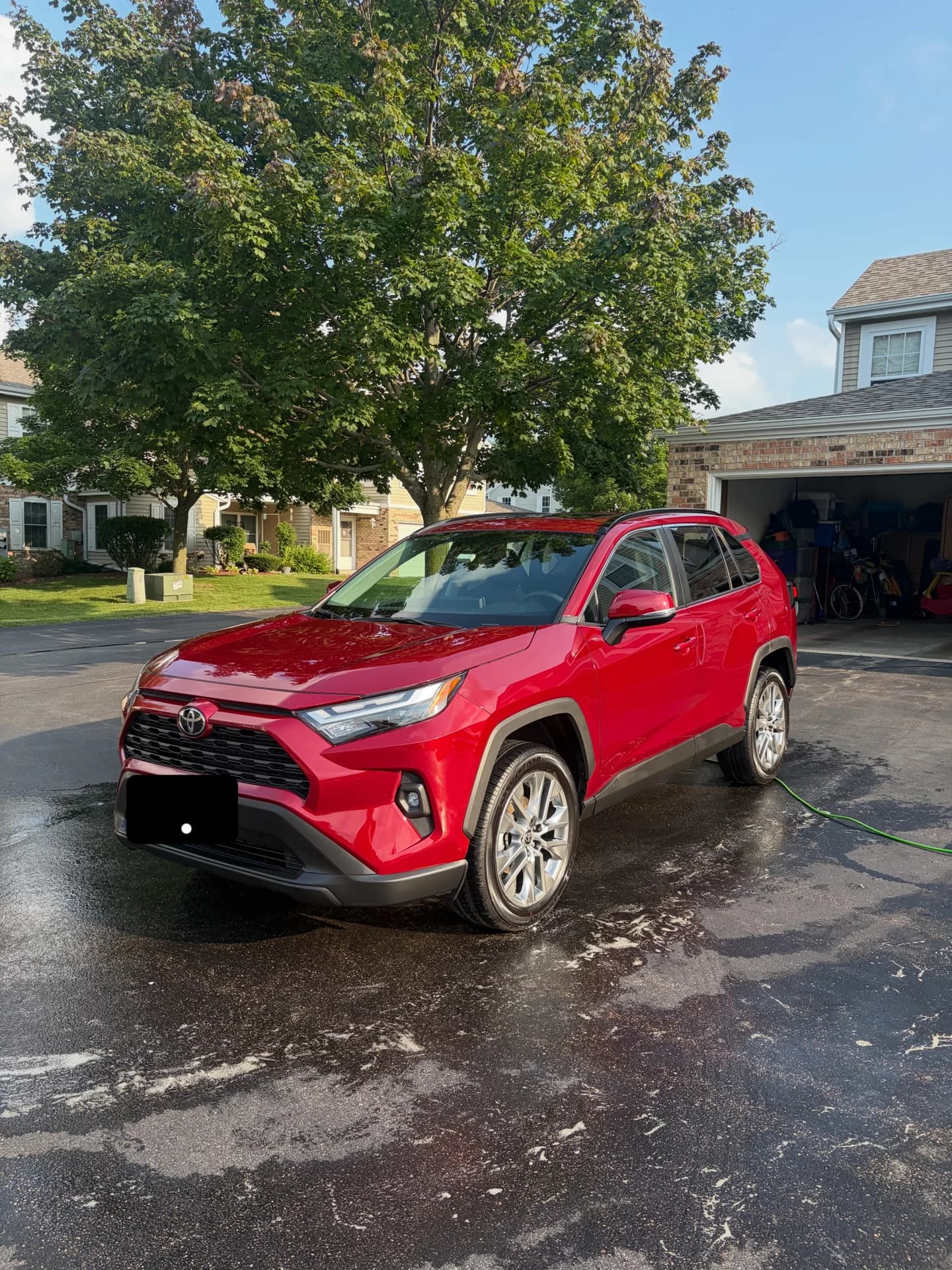 Red Toyota SUV after an exterior wash