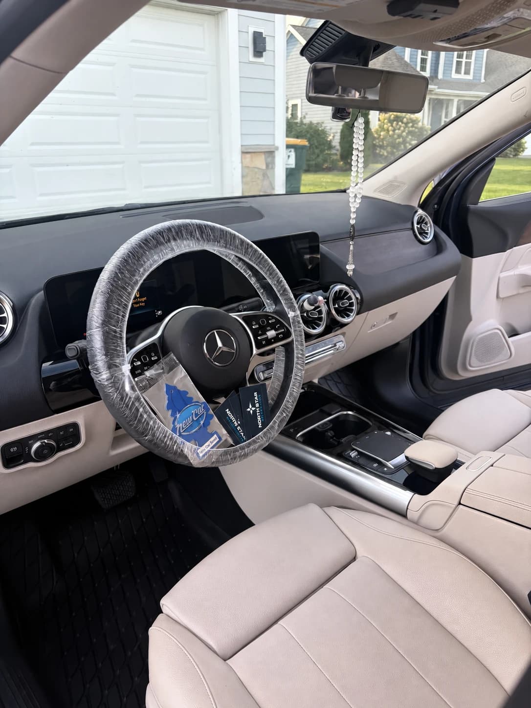 Freshly detailed Mercedes interior with ivory leather seats